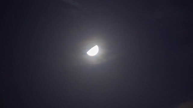 Flowing clouds with moon in Tokyo, Japan