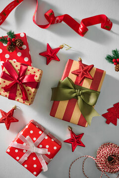 Christmas gifts beautifully wrapped and decorated with the ribbons