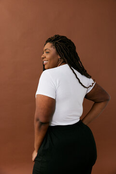 Back View of Woman in White Tee