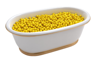 Oval white bathtub filled with many small, bright yellow balls