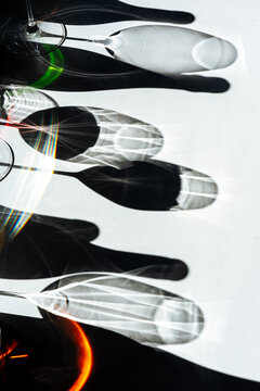  Shadows and reflections of wine glasses on surface