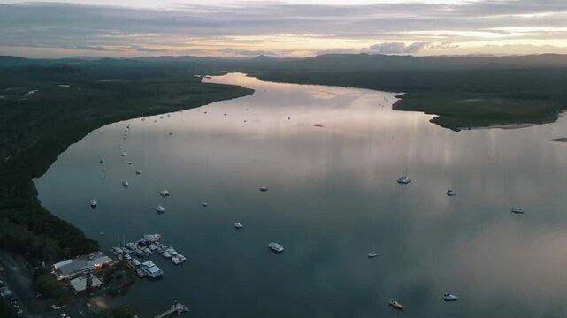 rone Footage of Tropical Queensland&rsquo;s Town of 1770 at Sunset &mdash; Golden Coastal Light, Coral Sea Views, and Gateway to the Great Barrier Reef&rsquo;s Pristine Marine Landscape