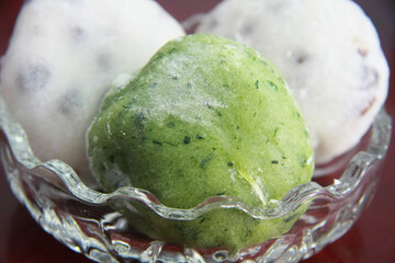 Wagashi: Vibrant Green and White Japanese Traditional Daifuku Mochi Dessert in Clear Glass Bowl
