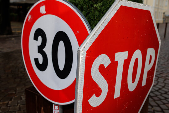 Red and white traffic signs