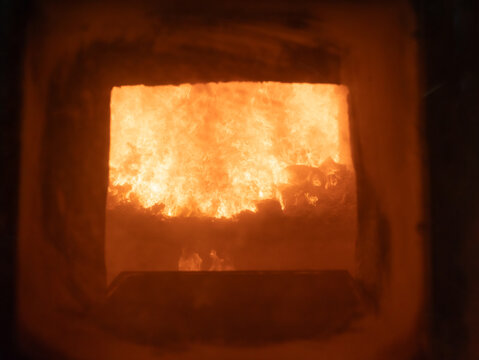 Waste Burning In Flames At Furnace