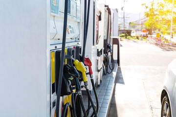 Gasoline station prepare for traveller fill to tank.
fuel pumps gasohol, gasoline ,benzine, at a gas station ,price gasoline concept.