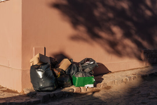 ity Garbage Piles in Urban Corner