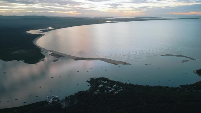 rone Footage of Tropical Queensland&rsquo;s Town of 1770 at Sunset &mdash; Golden Coastal Light, Coral Sea Views, and Gateway to the Great Barrier Reef&rsquo;s Pristine Marine Landscape