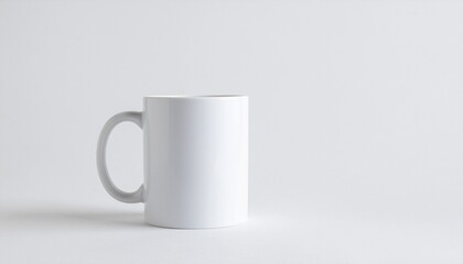 Obraz premium Minimalist White Ceramic Mug Mockup on Clean White Background, Studio Lighting