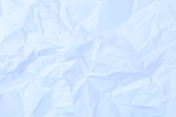 Obraz premium A series of crumpled paper textures, providing a rich, abstract background with intricate creases, shadows, and highlights, perfect for modern graphic design projects.