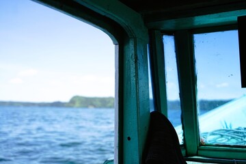 View inside the cabin of a wooden ship under sailing