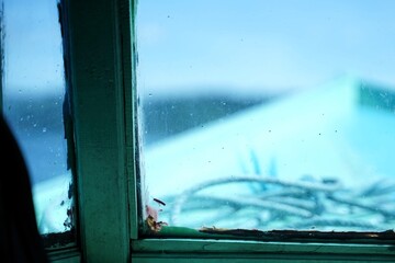 View inside the cabin of a wooden ship under sailing