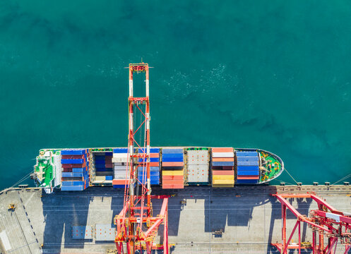 Aerial View of Cargo Ship and Colorful Containers at Port Termin