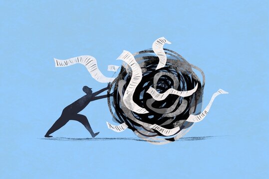 Person pushes  ball in front of him