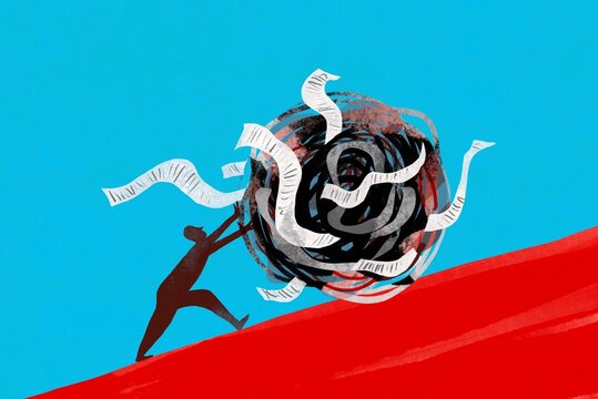 Person pushes  ball in front of him