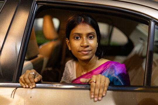 Close up portrait of a Bengali woman wearing traditional sari dress