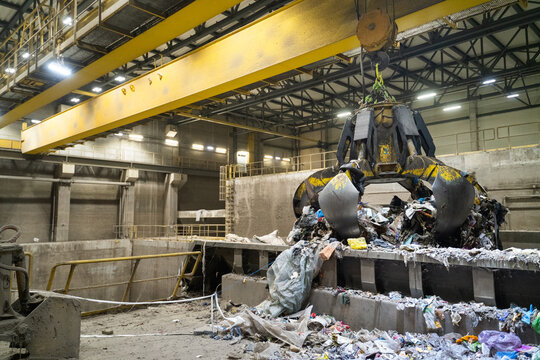 Heavy Machinery Operating in a Waste Processing Facility
