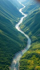Aerial view of a winding river through a lush green valley,  valley,  nature