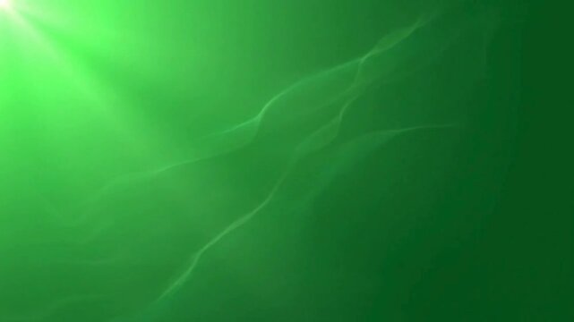 A green background with a bright light source emanating from the upper left corner area shown here
