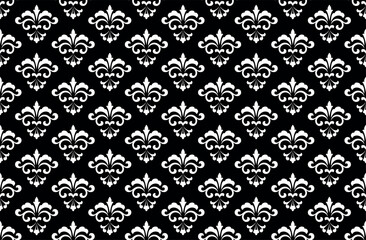Wallpaper in the style of Baroque. White and black floral ornament. Seamless vector background. Graphic pattern for fabric, wallpaper, packaging. Ornate Damask flower illustration.