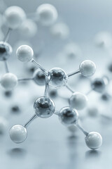 A molecular structure with interconnected spheres in a soft blue background.