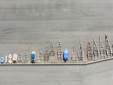 Aerial view of boats and trailers in storage area
