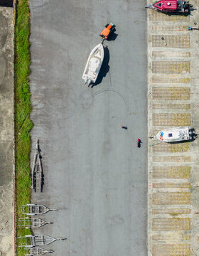 Aerial Boatyard Parking Boats Trailers and Grassy Border View