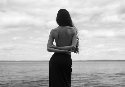 A Single Thoughtful Woman Enjoys Peace Of Mind