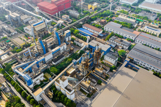 Aerial view of steel plant with workshops and chimneys