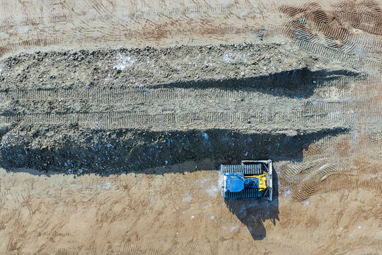 Aerial view of bulldozer working at construction site