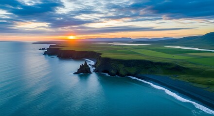 Aerial view of iceland coastline with black sand beach at sunset time