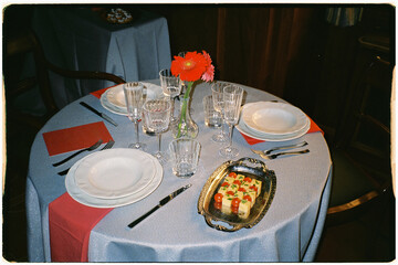 Close-up with flash of a table featuring sophisticated tableware