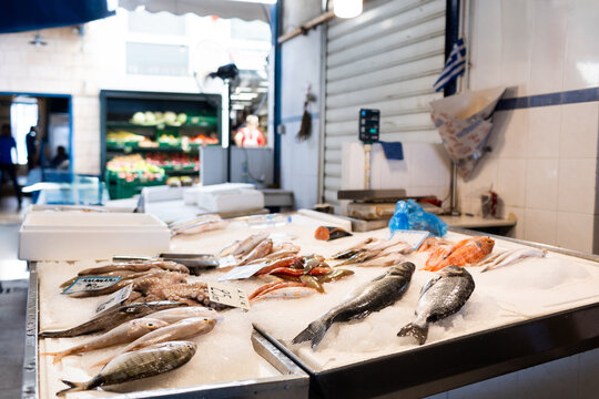 Fototapeta Fish shack in street market in Greek Island