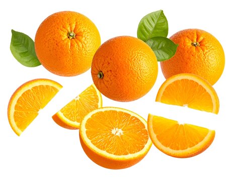 Composition of whole and sliced oranges with green leaves
