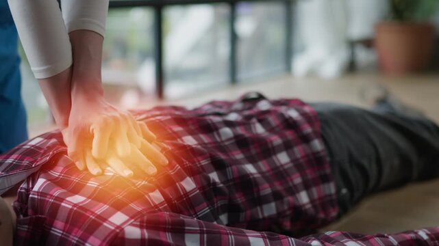Life-Saving CPR Action Urban Location Medical Training Content Indoor Environment Close-Up Viewpoint Emergency Response Concept