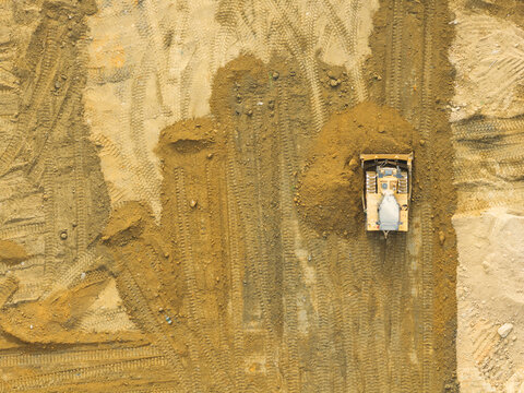 Bulldozer Pushing Earth Aerial View