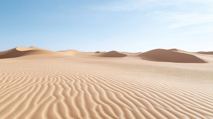 Endless sand dunes stretch under clear blue sky, creating serene desert landscape