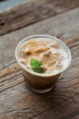 Iced coffee latte on wooden table