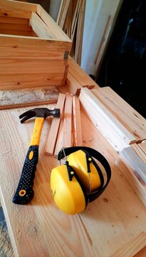 Carpenter Tools with Hammer and Earmuff.