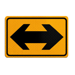 Rectangular yellow sign featuring two black directional arrows pointing in opposite directions