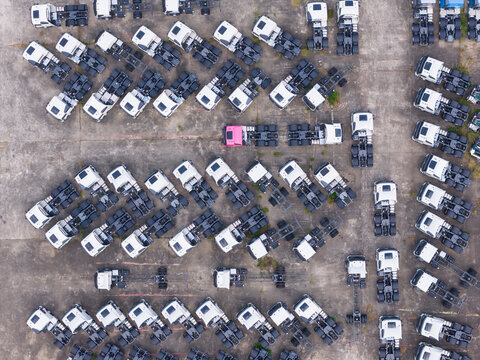 Aerial View of Truck Factory with White and Pink Cabs