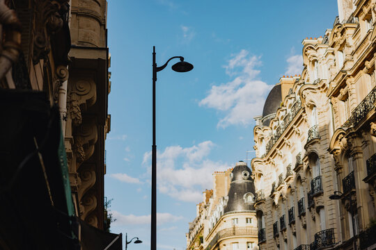 Skyline View of Parisian Architecture Under a Clear Blue Sky