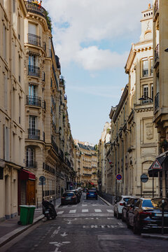 Narrow Parisian street with classic architecture