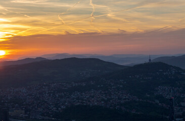 Obraz premium Atmospheric abstract photograph of a sunset over the natural landscapes of Bosnia and Herzegovina. Featuring vivid gradients, soft silhouettes, and warm tones that evoke emotion and tranquility