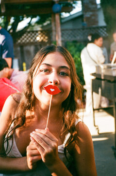 Girl with Photo Prop Lips