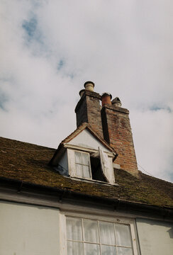 Old Brick Chimney and Dormer Window, England
