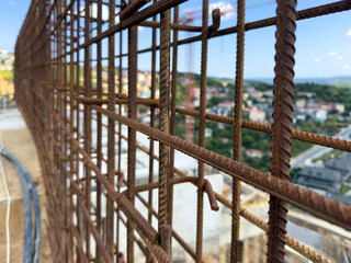 Close-up of rusted construction steel bars at the construction site