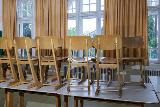 Chairs in a school are on the table