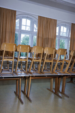 Chairs in a school are on the table