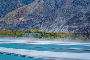 Beautiful autumn landscape with colorful trees in the mountains valley of skardu, gilgit baltistan, Pakistan